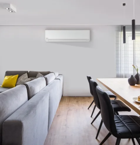 Living room with a wall-mounted air conditioning unit
